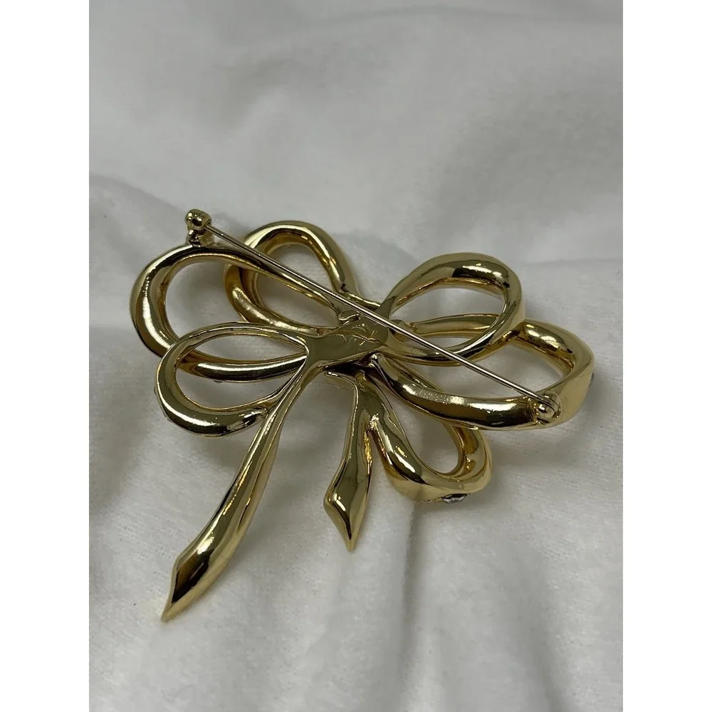 Vintage KJL For Avon Bow Pin Brooch Crystal Gold Tone Kenneth Jay Lane 2 3/4 In.